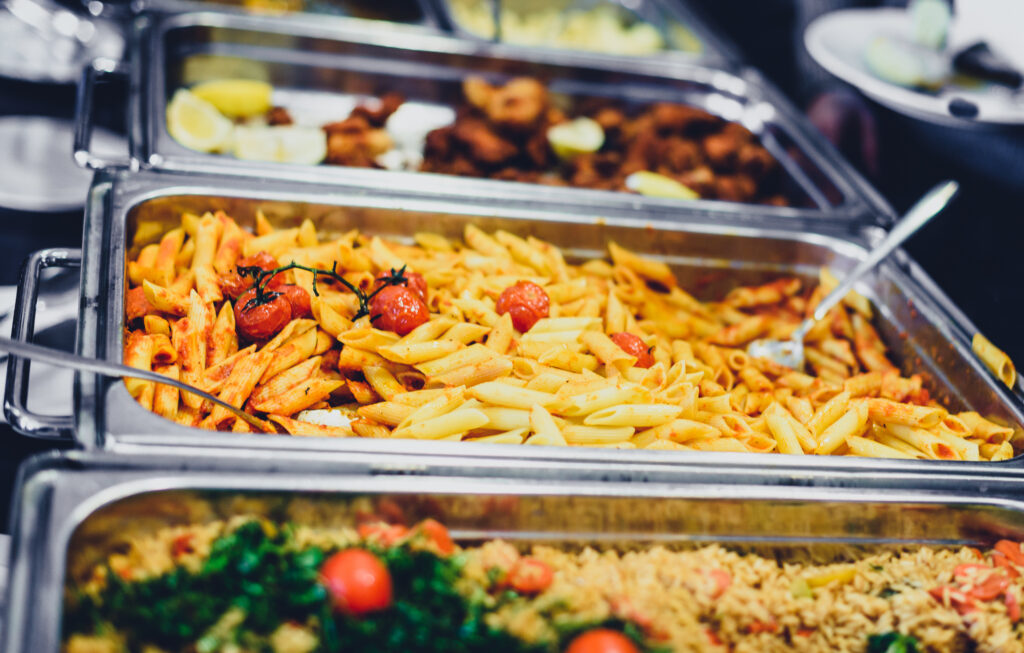 Image of Dinner Catering with meat and vegetables.